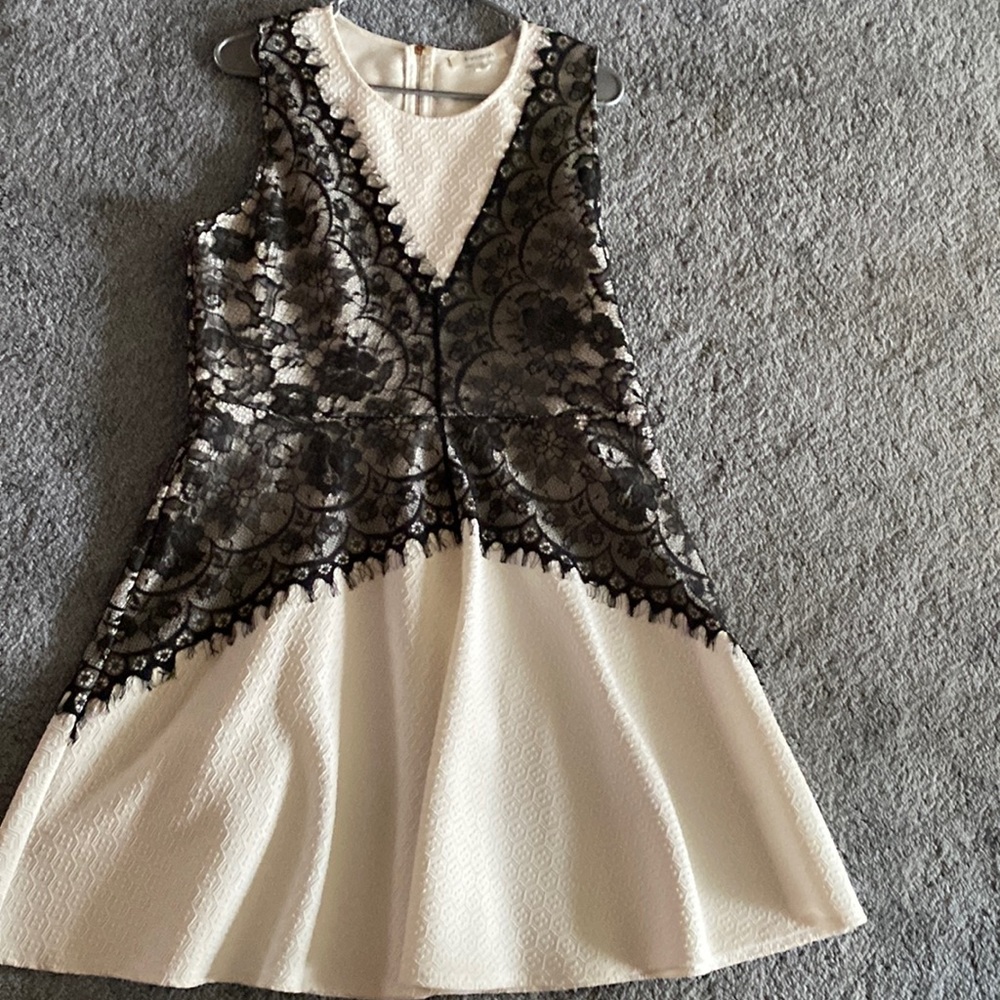Francesca’s black lace on a white dress size XL
